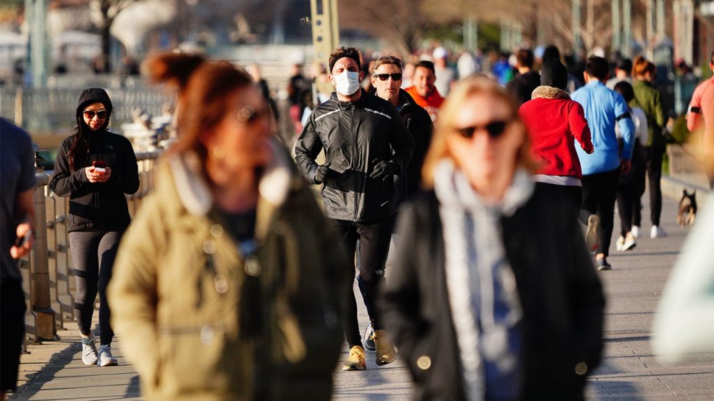 A lone mask-wearer in New York